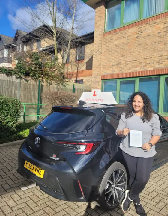 Student celebrating a practical driving test pass